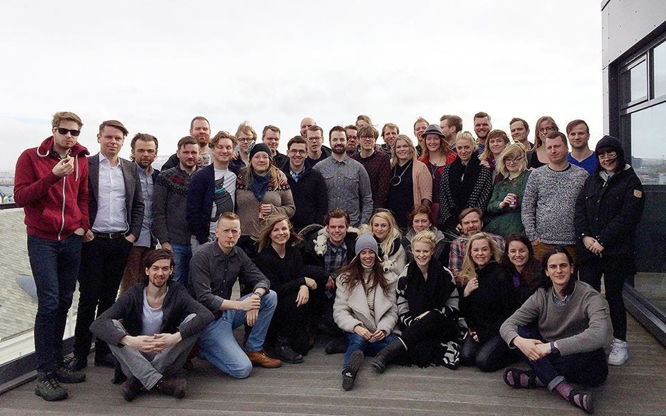 The QuizUp team posing for a group photograph.